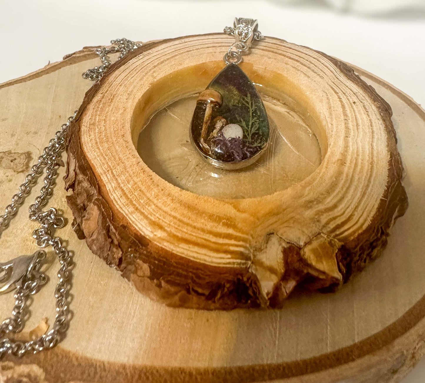 Forest Elegance: Teardrop Pendant with Northern Lights and Mushrooms
