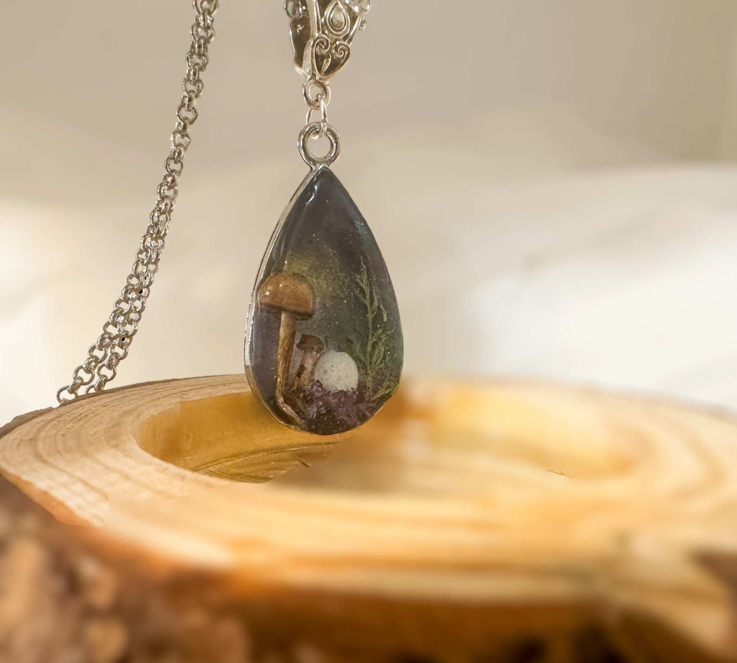 Forest Elegance: Teardrop Pendant with Northern Lights and Mushrooms