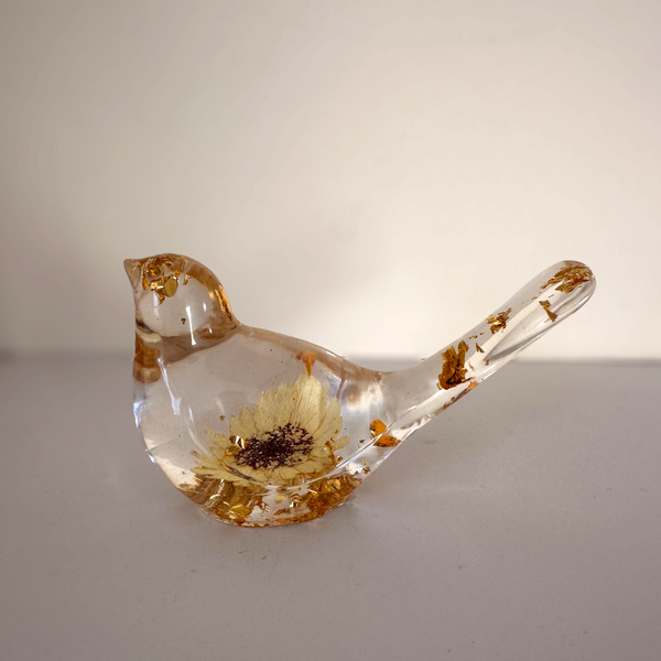 Handmade gold leaf resin bird from Cold Lake Alberta measuring 4 inches long
