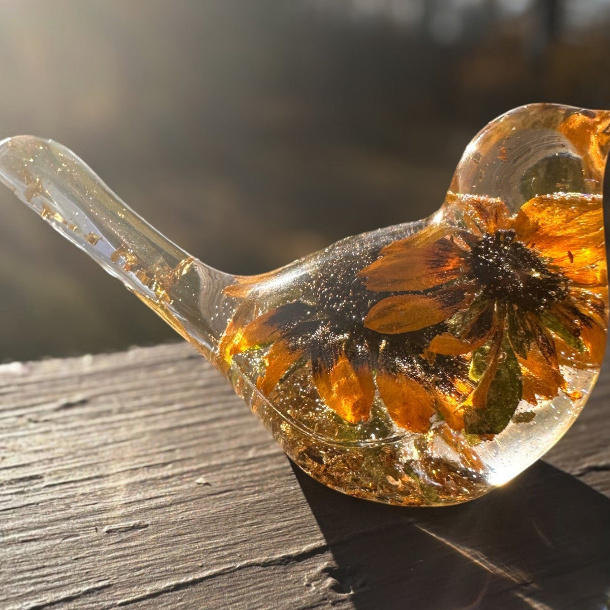 Black eyed susan bird figurine with two real two-tone blooms and gold leaf in clear resin