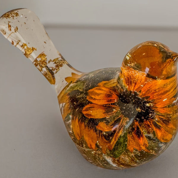 Black eyed susan bird figurine with two real two-tone blooms and gold leaf in clear resin