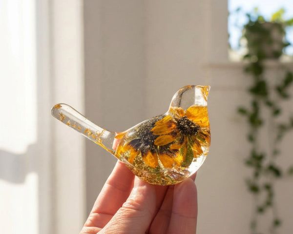 Black eyed susan bird figurine with two real two-tone blooms and gold leaf in clear resin