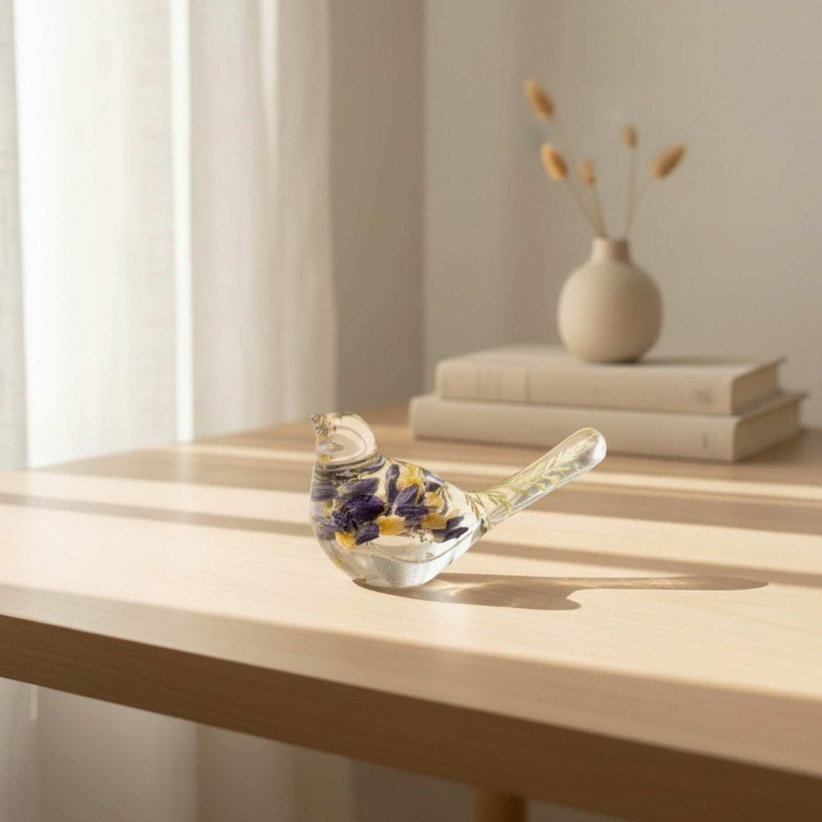 Blue Lupine resin bird decor, clear resin songbird with deep blue and yellow blooms and green botanicals in its tail