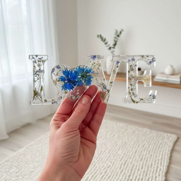 Forget me not resin love sign in clear resin with pressed blue flowers, baby's breath and silver leaf accents