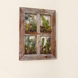 boreal forest window art featuring four botanical resin panes with mushrooms, green ferns and wildflowers in a weathered wood frame