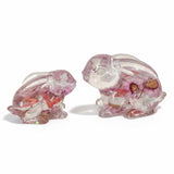 Two pink floral resin bunnies with preserved spring blooms, handcrafted decor pair