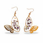 Handmade Fluttering Blossom earrings with real pressed flowers in resin butterfly wings and a delicate butterfly accent