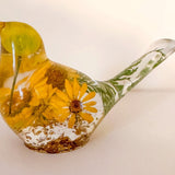 yellow canary resin bird with real yellow daisies, green foliage, and gold leaf base, handmade in Alberta