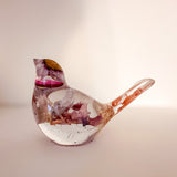 Close up of the dried blossoms inside a cherry blossom resin bird