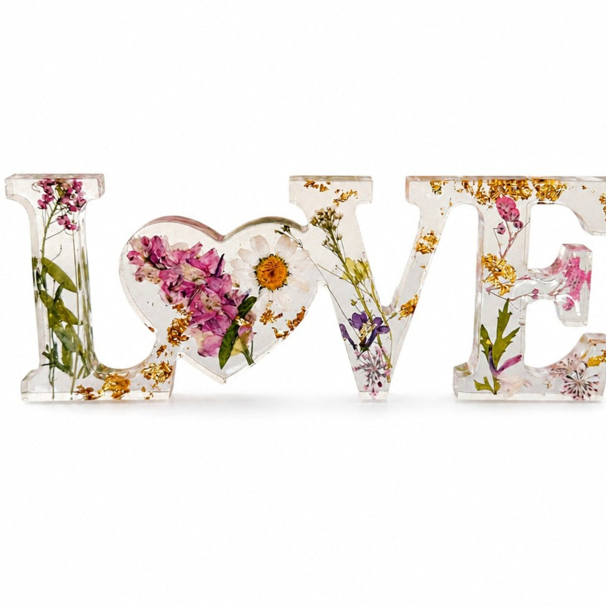 Daisy resin word art with real pressed white daisy in heart-shaped O, blush blooms, and gold leaf flakes
