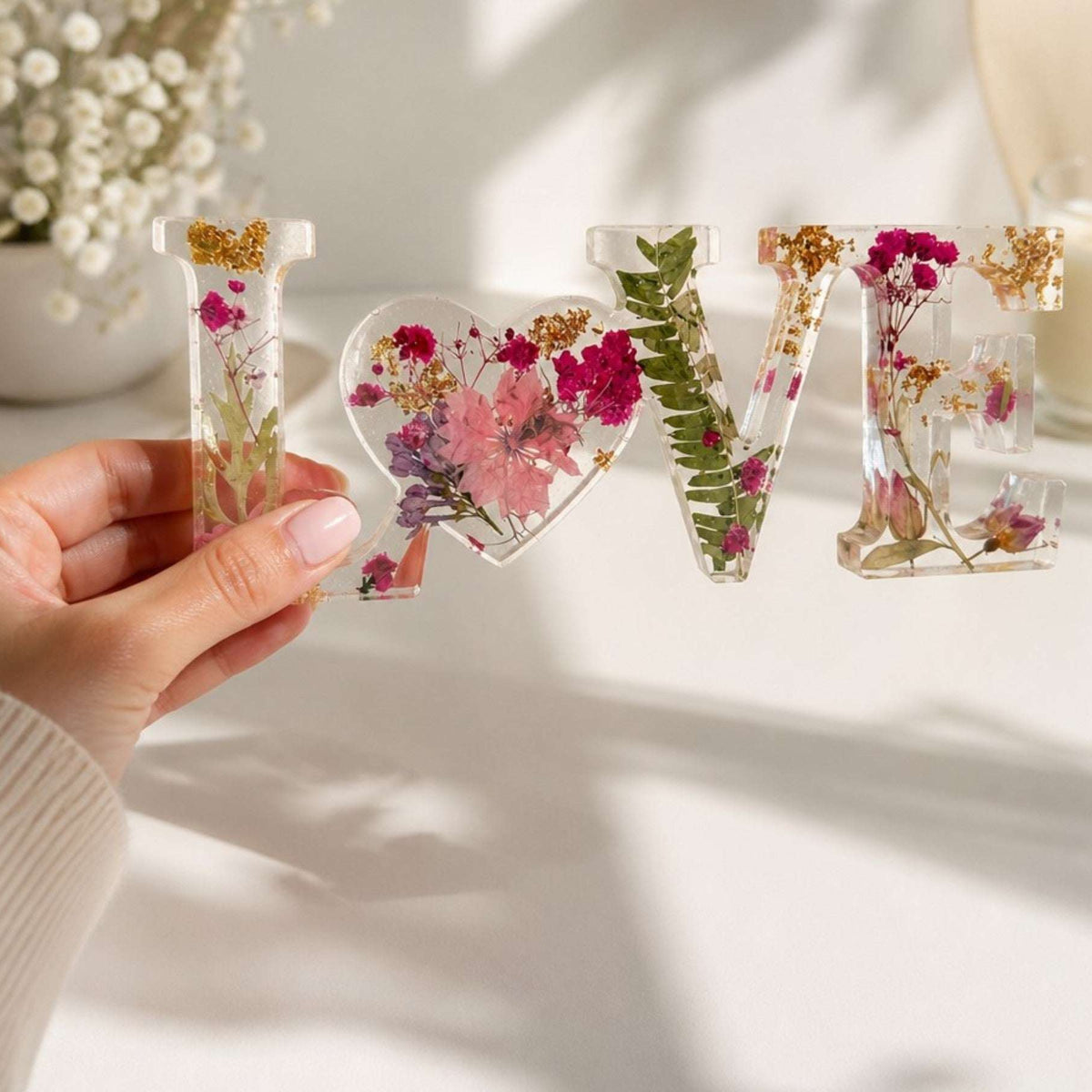 Fuchsia Garden LOVE resin word art with real pink and fuchsia flowers, fern fronds, and gold leaf flakes