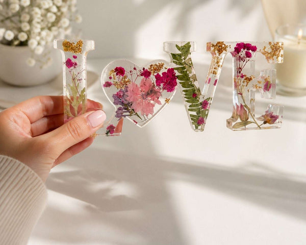 Fuchsia Garden LOVE resin word art with real pink and fuchsia flowers, fern fronds, and gold leaf flakes
