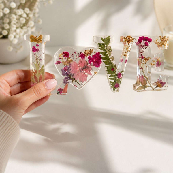 Fuchsia Garden LOVE resin word art with real pink and fuchsia flowers, fern fronds, and gold leaf flakes
