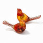 Resin Bird Pair of two clear resin birds with red, orange, and yellow dried flowers and red botanical tails.