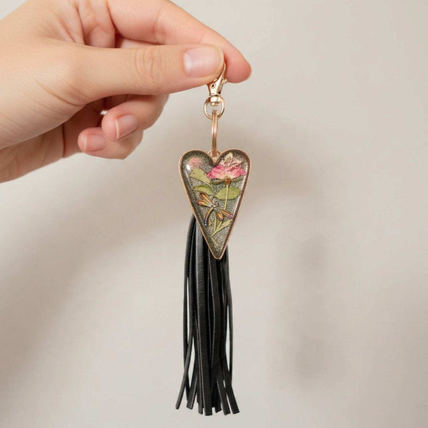 Dragonfly resin keychain with a floral heart-shaped resin pendant, pink rose, colorful dragonfly and long black tassel