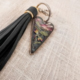 Dragonfly resin keychain with a glossy heart-shaped resin pendant, pressed pink flower, colourful dragonfly and black tassel