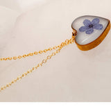 Handmade forget-me-not heart pendant with real blue flower on gold chain