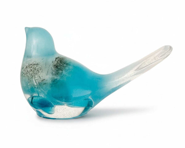 Aurora Wish Songbird teal glow resin bird decor with preserved dandelion seed in deep teal resin glowing softly