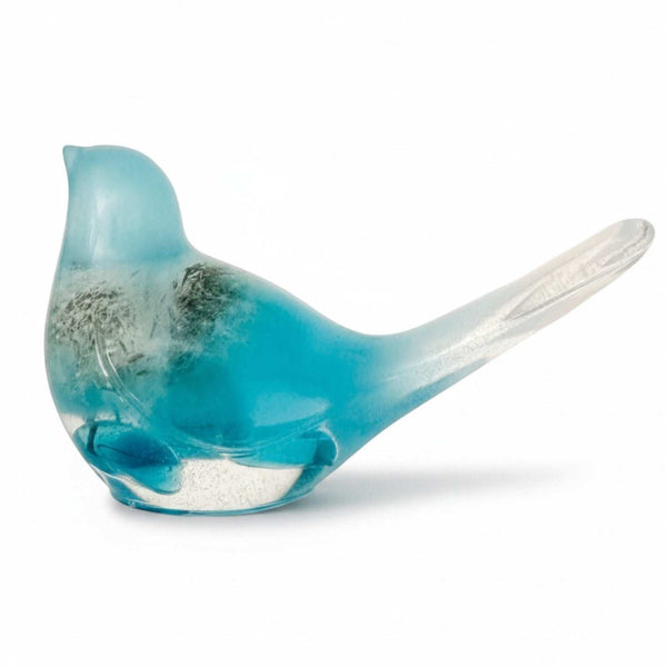 Aurora Wish Songbird teal glow resin bird decor with preserved dandelion seed in deep teal resin glowing softly