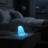 Glow in the dark resin bird decor with real dandelion puff inside glowing blue resin
