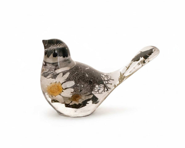 Handmade chickadee in clear resin with real black and white flowers set inside