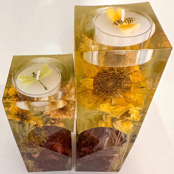 heart tealight holder set with two clear resin pieces, yellow dried sunflowers, dark red roses and sage green backing