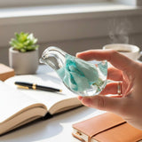 Blue Rose Songbird rainbow rose resin bird decor with real blue tinted rainbow rose in cool aqua resin, handmade Canada
