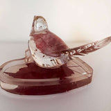 Maple leaf bird and tray set in clear glossy resin with deep red dried leaves and scattered gold flecks, sculpted bird atop a tray.