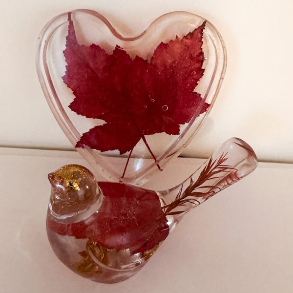 Maple leaf bird and tray set in clear resin, with red pressed maple leaves, gold flecks and a heart-shaped tray.