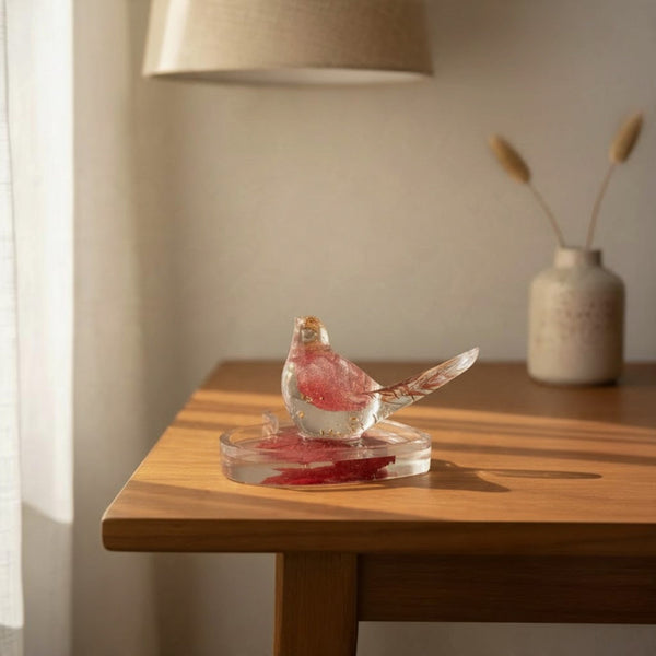 Maple leaf bird and tray set in clear resin, with red leaves and gold flecks in a bird perched on a clear tray.