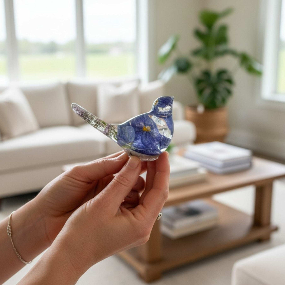 Handmade Forever Songbird memorial resin bird with preserved forget-me-nots and customizable base finish
