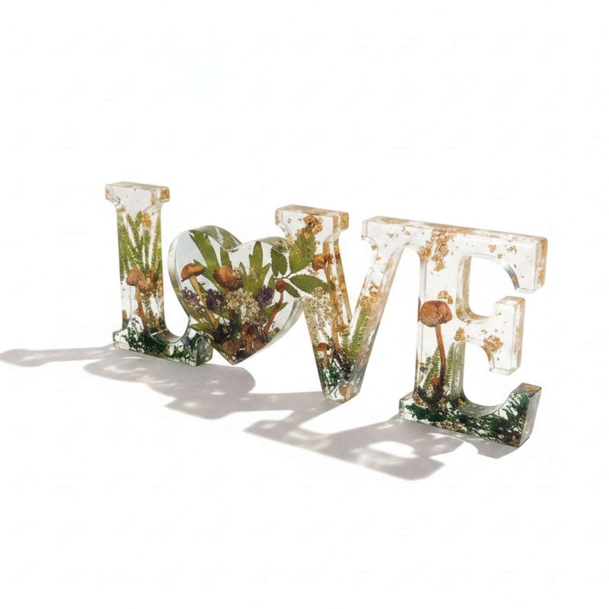 Boreal Mushroom LOVE word art with real mushrooms, ferns, moss, and gold leaf in clear resin decor