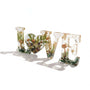 Boreal Mushroom LOVE word art with real mushrooms, ferns, moss, and gold leaf in clear resin decor