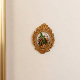 Mushroom fridge magnet on a fridge door, real forest mushrooms and ferns visible through the clear resin