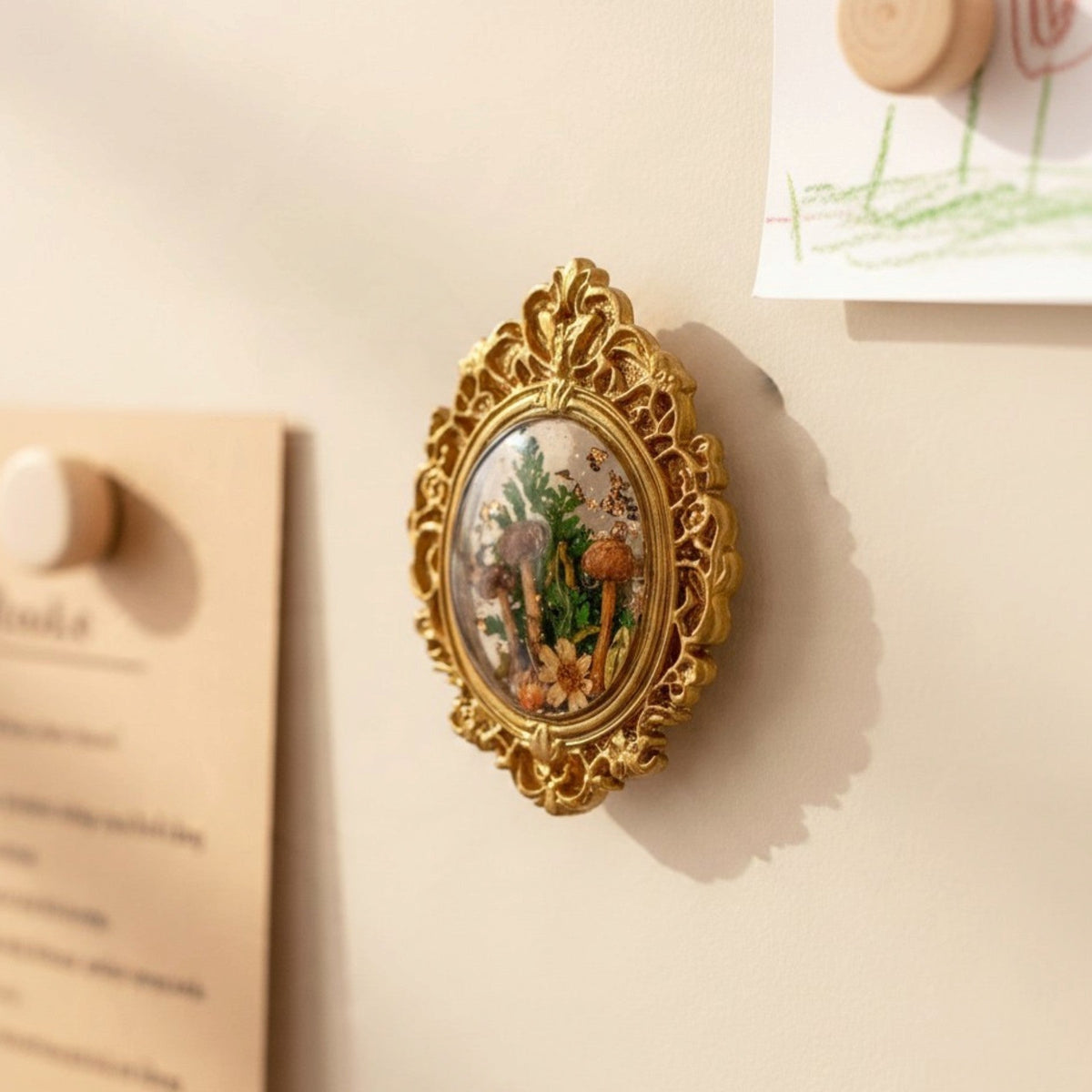 Mushroom fridge magnet holding on a fridge door with the clear resin picking up the surface behind it