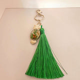 Handmade mushroom owl keychain from Cold Lake Alberta with real boreal forest botanicals