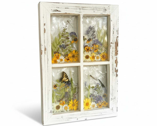 Pressed Flower Window Frame with white distressed wood, clear resin panes featuring real dried wildflowers, a swallowtail butterfly, and dragonflies with holographic backing.