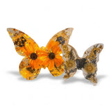 Light up resin butterfly decor set with two clear resin butterflies, orange blooms, dried flowers, and gold leaf‑style accents.