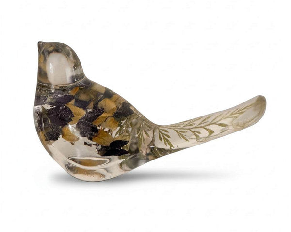 Blue Lupine resin bird decor in clear resin, with embedded purple and golden blooms and delicate green fronds in its tail.
