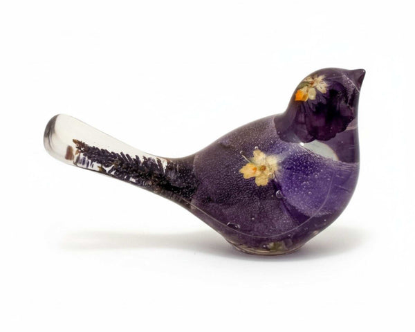 Handmade Purple Pansy resin bird decor featuring real pressed flowers and purple sage in a clear resin body and tail.