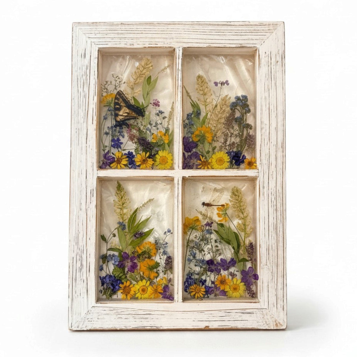 Pressed flower window art with a swallowtail butterfly and wildflowers in four resin panes