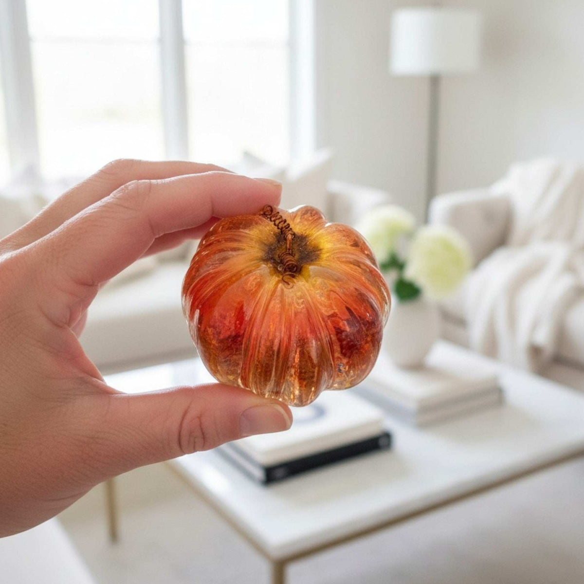 small resin pumpkin decor with real strawflower petals and copper wire stem