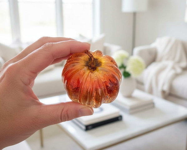 small resin pumpkin decor with real strawflower petals and copper wire stem
