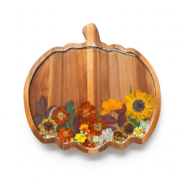 Handmade wooden pumpkin tray with real pressed sunflower, dried botanicals, bee charm, and gold glitter for fall decor