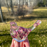 Purple lupine resin bird figurine with dried lupine blooms and green stems
