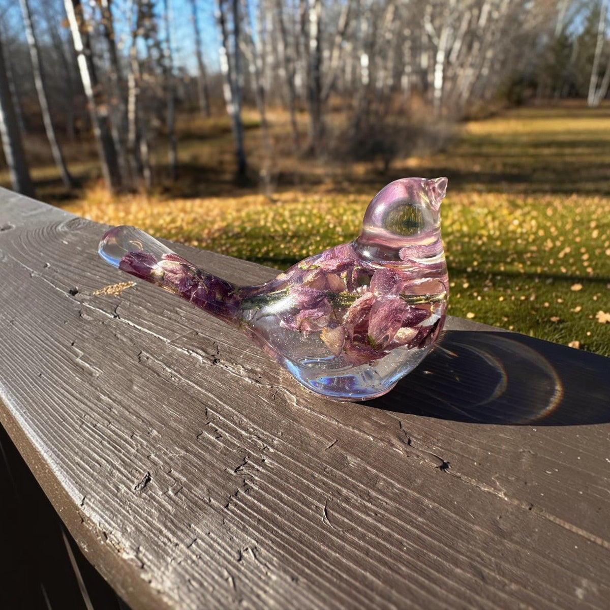 Close up of the dried lupines inside a purple lupine resin bird
