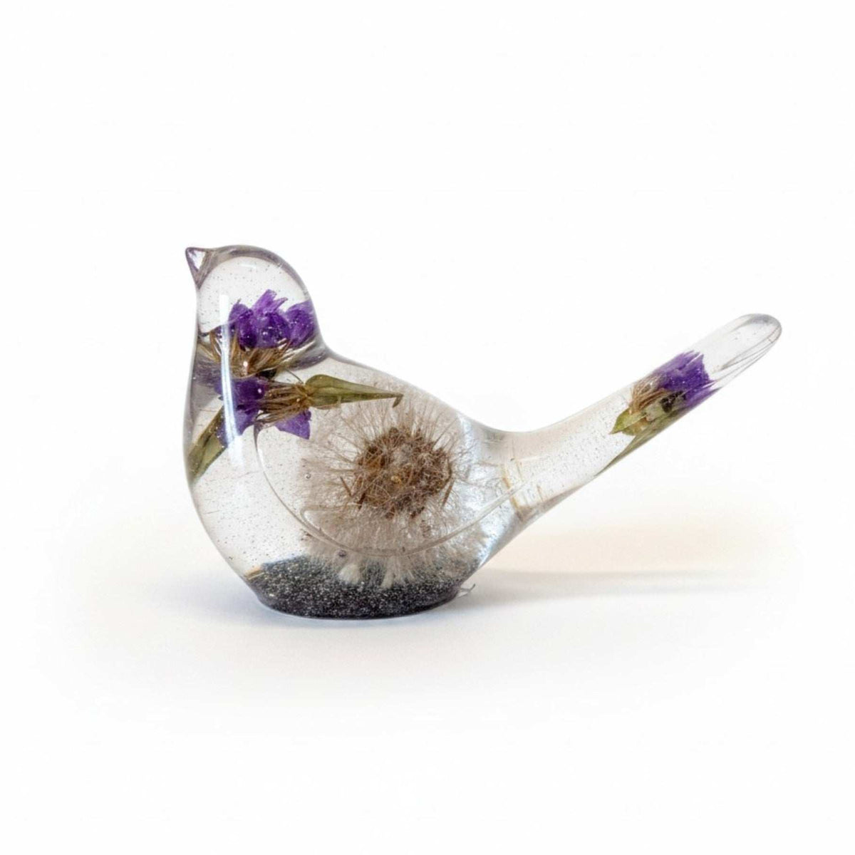 Handcrafted purple dandelion resin bird with real purple petals and dandelion seeds