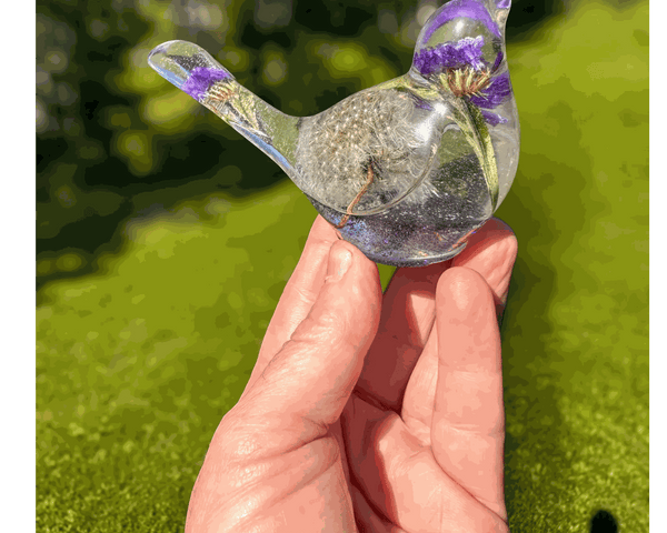 Purple dandelion resin bird with real purple petals and preserved dandelion seeds