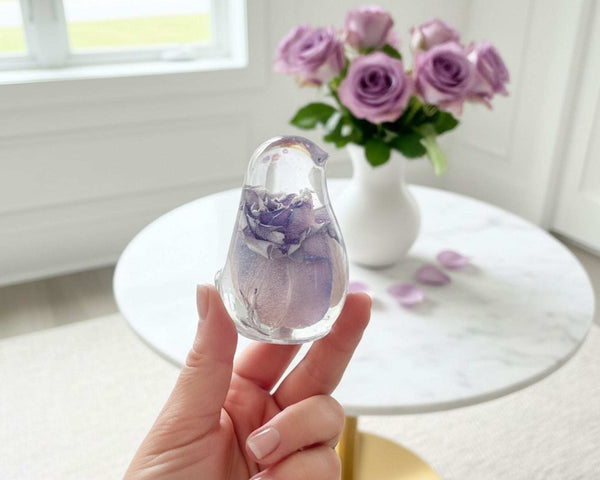 Handcrafted purple rose resin bird decor with preserved lavender rose inside