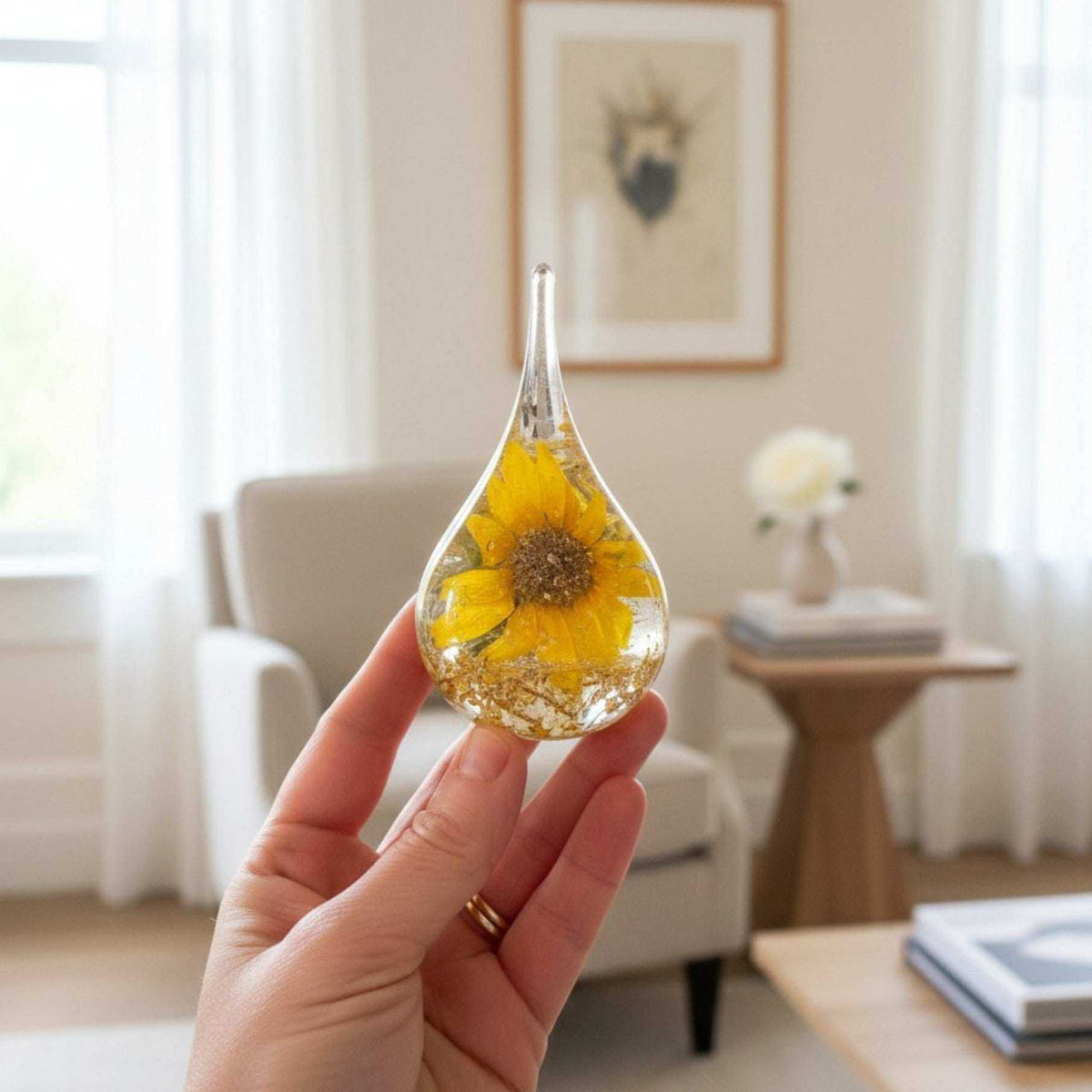 Summer Soltice Sunflower resin ring holder featuring a real yellow sunflower and gold leaf accents.